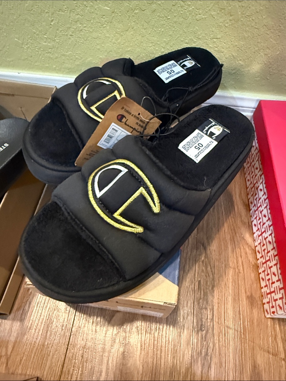 Champion Black Quilted Slides with Yellow Embroidered Logo